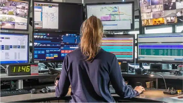 female telecommunicator working diligently