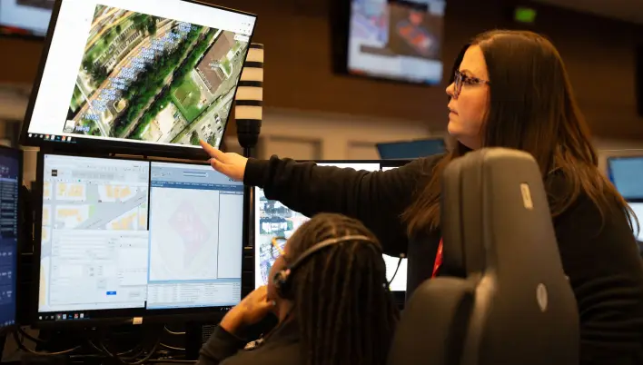 two telecommunicators responding to a call